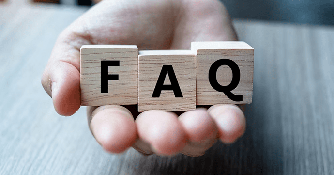 A man pointing to a question mark